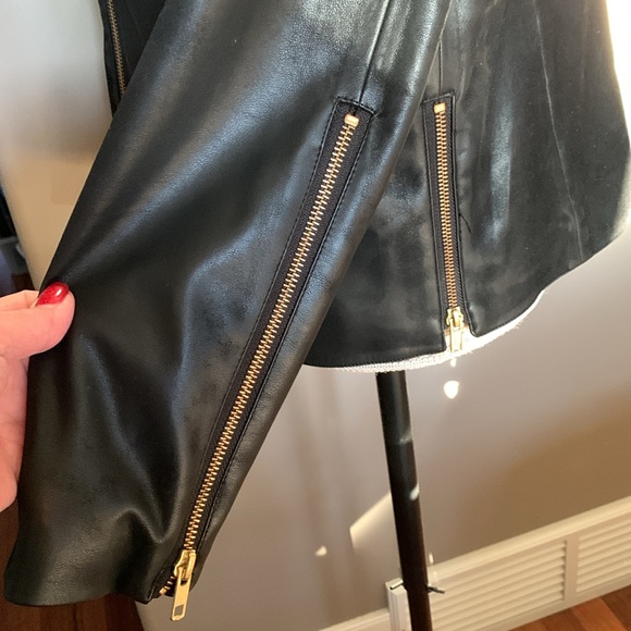 Charcoal colored leather jacket. Zippers on sleeves pockets and sides. No damage - Picture 4 of 12
